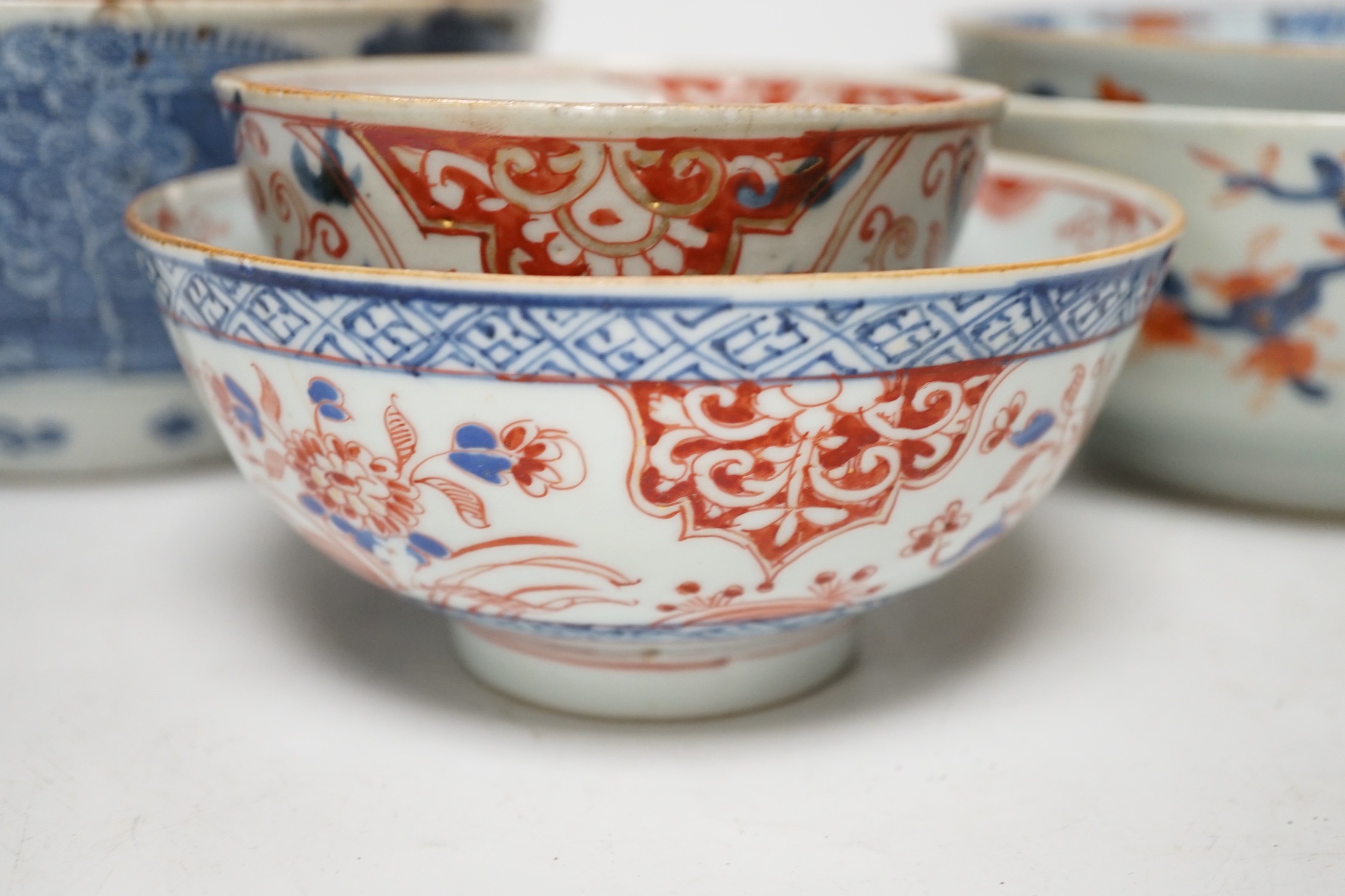 Six 18th century Chinese porcelain bowls (a.f.) and a Chinese imari plate, largest bowl 20cm diameter